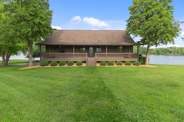 100 Acree Ln, Estill Springs, TN 37330 - back of house featuring a sunroom, a water view, a yard, and roof with shingles
