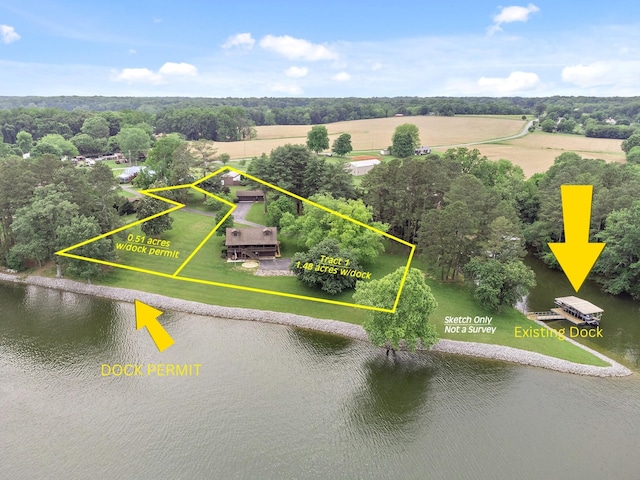 100 Acree Ln, Estill Springs, TN 37330 - view of property location with a large body of water, property parcel outlined, and a tree filled landscape