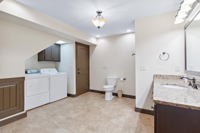 100 Acree Ln, Estill Springs, TN 37330 - bathroom featuring washing machine and dryer, vanity, toilet, baseboards, and recessed lighting