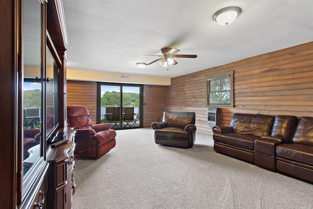 100 Acree Ln, Estill Springs, TN 37330 - living area with carpet floors, ceiling fan, wood walls, and heating unit