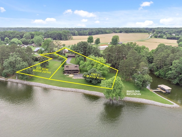 100 Acree Ln, Estill Springs, TN 37330 - aerial view of sparsely populated area with a nearby body of water, property parcel outlined, and a tree filled landscape