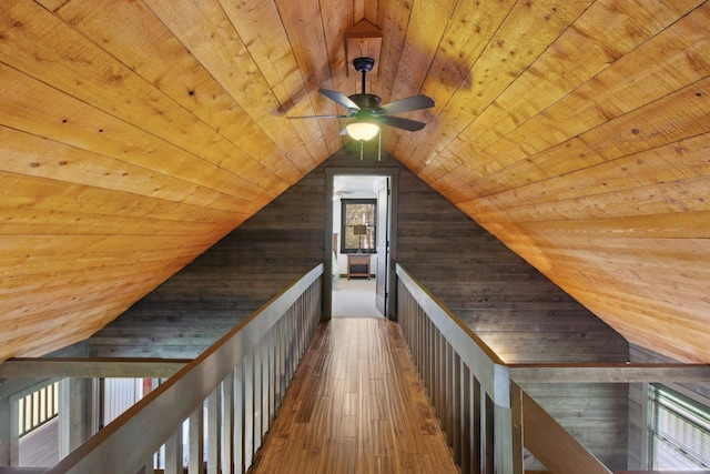 100 Acree Ln, Estill Springs, TN 37330 - corridor featuring wooden ceiling, an upstairs landing, wood walls, vaulted ceiling, and hardwood / wood-style floors