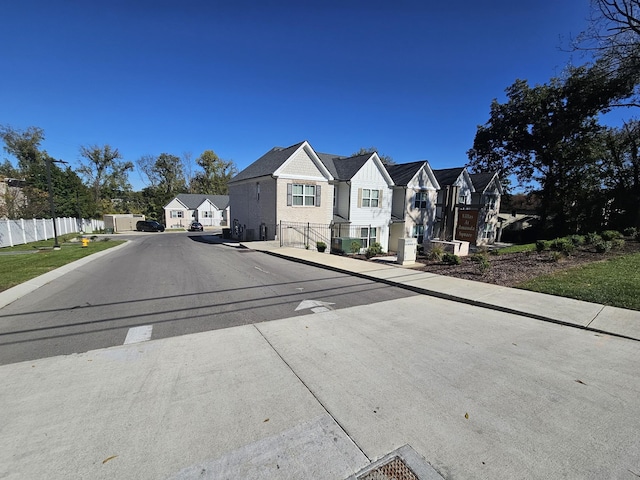 923 SE Broad St Unit A4, Murfreesboro, TN 37130 - view of concrete street featuring a residential view, curbs, and sidewalks