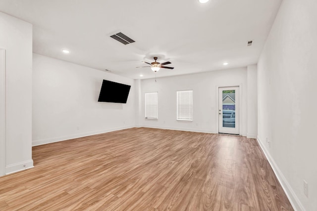 923 SE Broad St Unit A4, Murfreesboro, TN 37130 - unfurnished living room featuring a ceiling fan, light wood finished floors, and recessed lighting