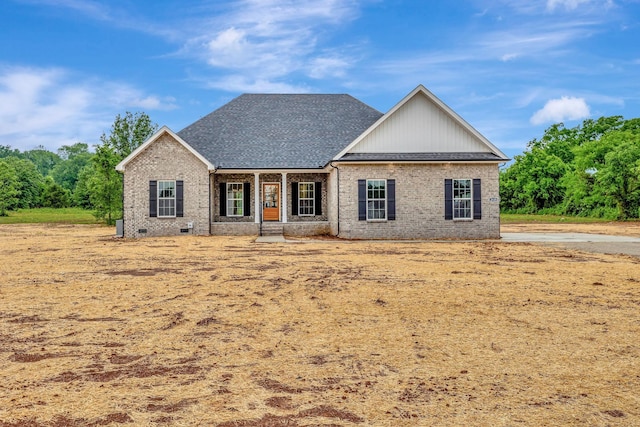 2125 Halls Mill Rd, Unionville, TN 37180 - view of front of home featuring brick siding, a porch, and a shingled roof