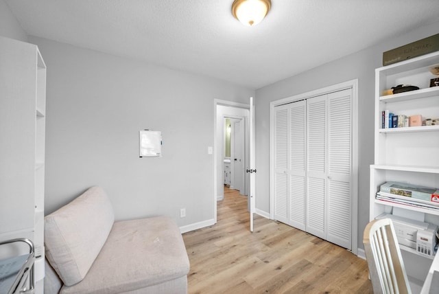 202 Jim Thorpe Dr, Clarksville, TN 37042 - living area with light wood-style flooring and baseboards
