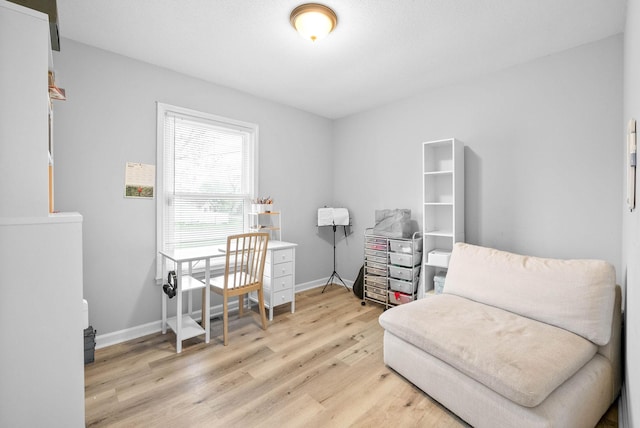 202 Jim Thorpe Dr, Clarksville, TN 37042 - sitting room with light wood finished floors, baseboards, and an office area