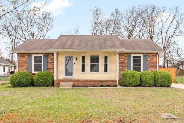 202 Jim Thorpe Dr, Clarksville, TN 37042 - view of front of home with brick siding and a shingled roof