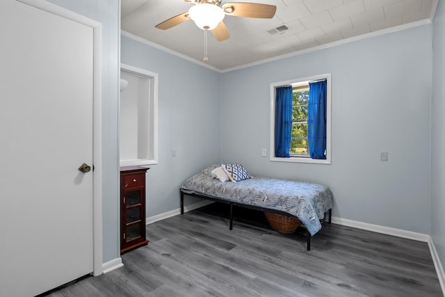 1090 Eva Harbor Rd, Eva, TN 38333 - bedroom featuring wood finished floors, baseboards, ornamental molding, and ceiling fan