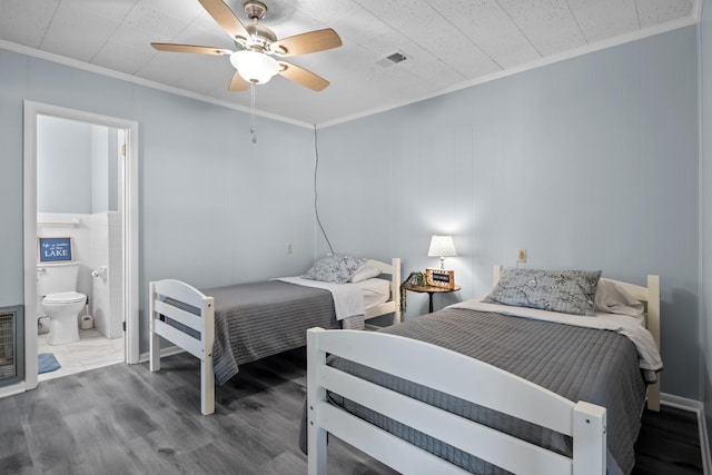 1090 Eva Harbor Rd, Eva, TN 38333 - bedroom with ornamental molding, wood finished floors, connected bathroom, and ceiling fan