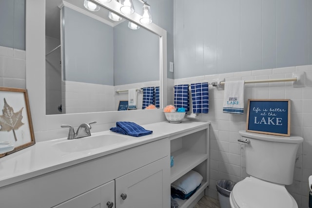 1090 Eva Harbor Rd, Eva, TN 38333 - bathroom featuring vanity, toilet, and tile walls