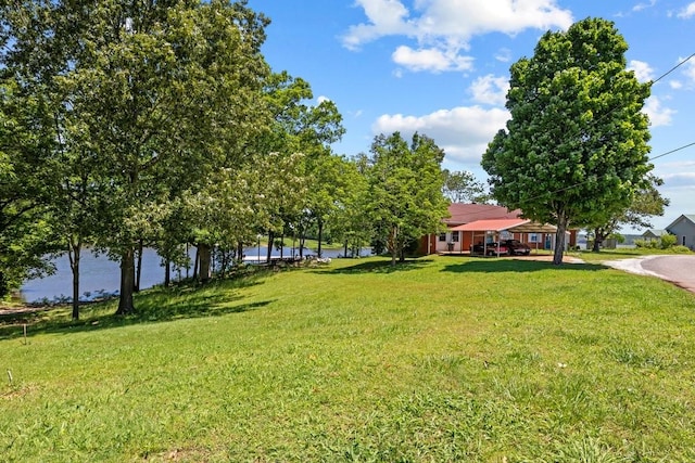 1090 Eva Harbor Rd, Eva, TN 38333 - view of green lawn with a water view