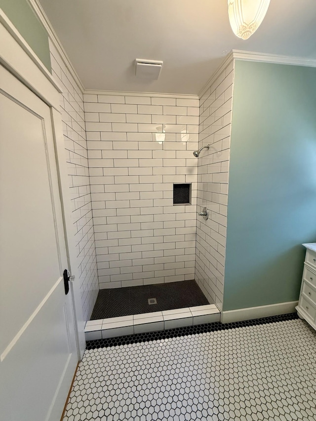 425 Arlington Ave, Jackson, TN 38301 - bathroom with a stall shower, tile patterned flooring, vanity, crown molding, and baseboards