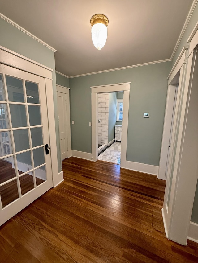 425 Arlington Ave, Jackson, TN 38301 - spare room with wood-type flooring, ornamental molding, and baseboards