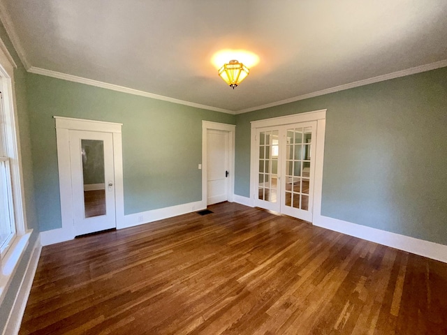 425 Arlington Ave, Jackson, TN 38301 - spare room featuring french doors, wood finished floors, baseboards, and ornamental molding