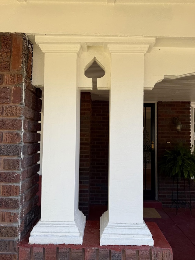 425 Arlington Ave, Jackson, TN 38301 - doorway to property featuring brick siding and a porch