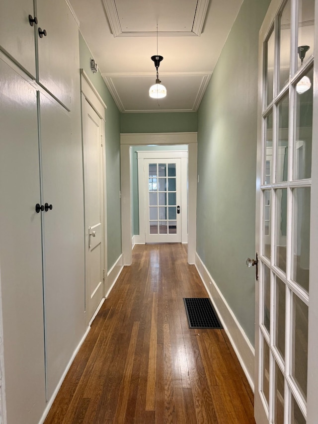425 Arlington Ave, Jackson, TN 38301 - corridor featuring wood-type flooring, attic access, and baseboards