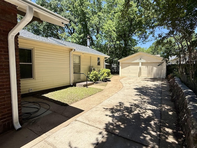 425 Arlington Ave, Jackson, TN 38301 - view of patio / terrace with a detached garage and an outbuilding