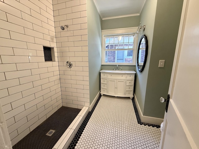 425 Arlington Ave, Jackson, TN 38301 - full bathroom with a tile shower, vanity, ornamental molding, baseboards, and tile patterned flooring