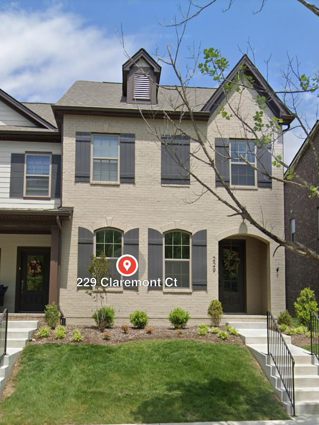 229 Claremont Ct, Gallatin, TN 37066 - view of front of house featuring brick siding and a front yard