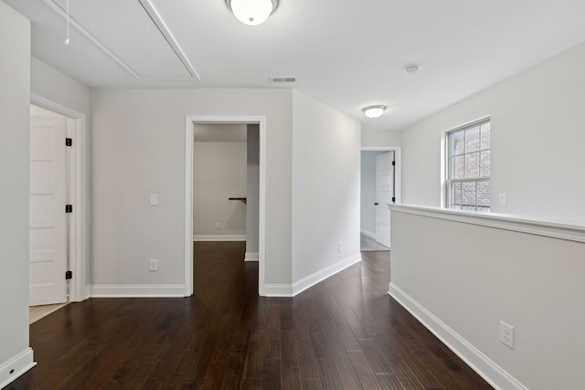 229 Claremont Ct, Gallatin, TN 37066 - corridor featuring attic access, dark wood-type flooring, and baseboards