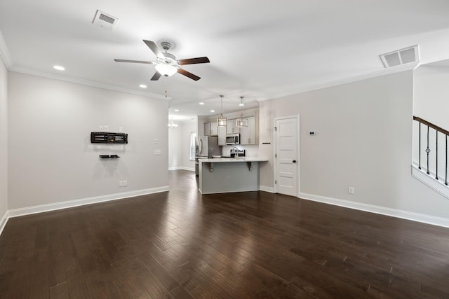 229 Claremont Ct, Gallatin, TN 37066 - unfurnished living room with a ceiling fan, recessed lighting, baseboards, crown molding, and dark wood finished floors