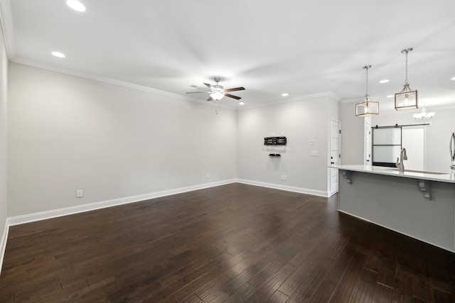 229 Claremont Ct, Gallatin, TN 37066 - unfurnished living room featuring recessed lighting, a barn door, ceiling fan, dark wood-style floors, and baseboards