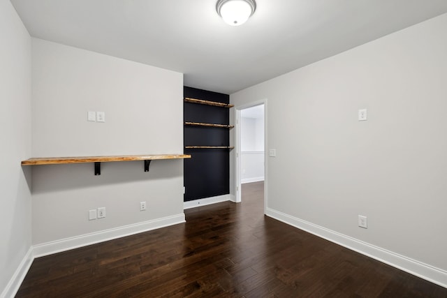 229 Claremont Ct, Gallatin, TN 37066 - empty room with dark wood finished floors and baseboards