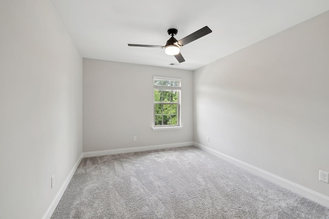 229 Claremont Ct, Gallatin, TN 37066 - carpeted spare room with baseboards and a ceiling fan