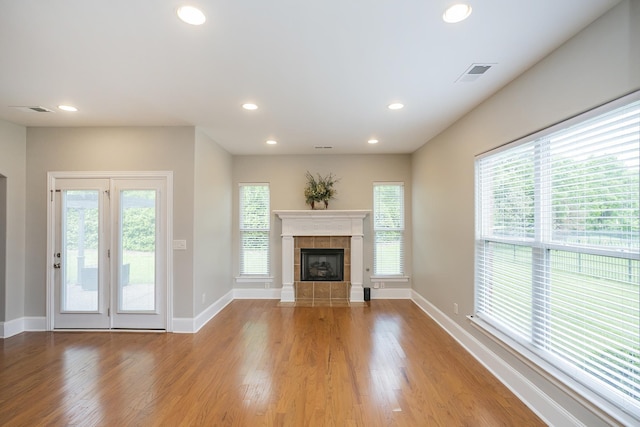 2732 Avington Ct, Murfreesboro, TN 37128 - unfurnished living room featuring wood finished floors, baseboards, healthy amount of natural light, and recessed lighting