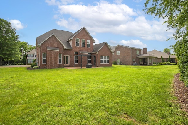 2732 Avington Ct, Murfreesboro, TN 37128 - rear view of house with brick siding, a yard, and a patio area