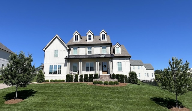 235 Belgian Rd, Nolensville, TN 37135 - view of front facade featuring a front lawn, a standing seam roof, and metal roof