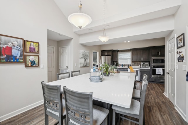 803 Bradford Pl, Murfreesboro, TN 37130 - dining room featuring dark wood-style floors, baseboards, and high vaulted ceiling