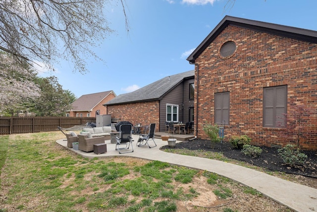 803 Bradford Pl, Murfreesboro, TN 37130 - back of house with an outdoor hangout area, brick siding, and a patio area