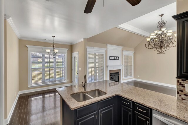 499 Williamsport Dr, Smyrna, TN 37167 - kitchen with a sink, open floor plan, a chandelier, ceiling fan, and dark cabinets