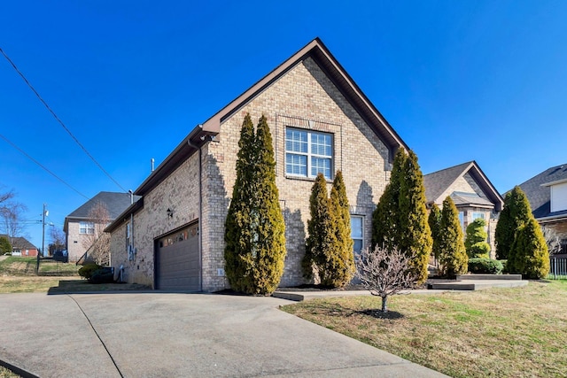 499 Williamsport Dr, Smyrna, TN 37167 - view of front of property featuring brick siding, concrete driveway, and a front yard