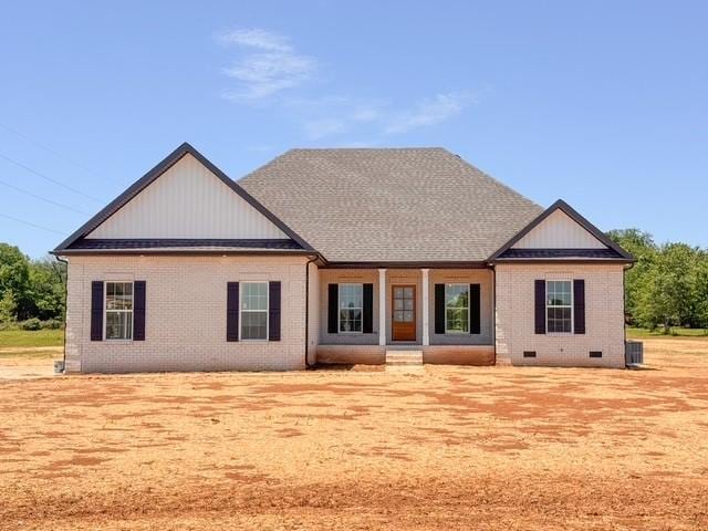 2121 Halls Mill Rd, Unionville, TN 37180 - rear view of property with brick siding, crawl space, and covered porch