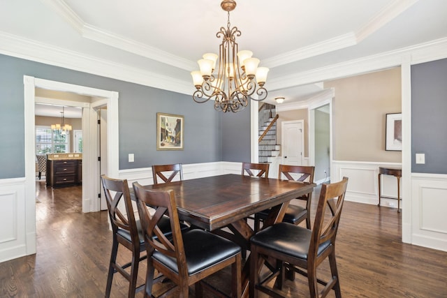 5108 Duckhorn Ct, Franklin, TN 37067 - dining space featuring a chandelier, stairway, a wainscoted wall, dark wood-type flooring, and ornamental molding