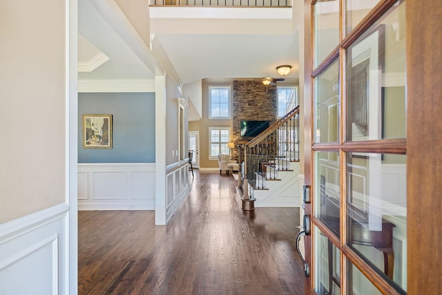 5108 Duckhorn Ct, Franklin, TN 37067 - entryway with a ceiling fan, a decorative wall, stairway, wood finished floors, and wainscoting
