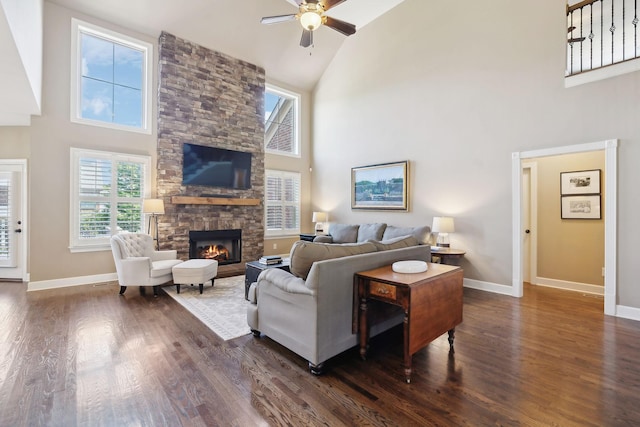 5108 Duckhorn Ct, Franklin, TN 37067 - living room featuring high vaulted ceiling, a ceiling fan, dark wood-style flooring, a fireplace, and baseboards