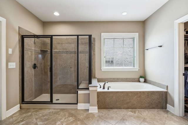 5108 Duckhorn Ct, Franklin, TN 37067 - full bathroom featuring a garden tub, a stall shower, a spacious closet, and tile patterned floors