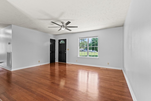 4008 Michelle St, Murfreesboro, TN 37128 - empty room featuring ceiling fan, wood finished floors, a textured ceiling, and baseboards