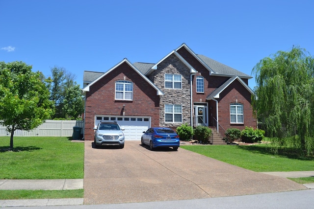 201 Abbey Rd, Lebanon, TN 37090 - view of front of home with concrete driveway, an attached garage, and brick siding