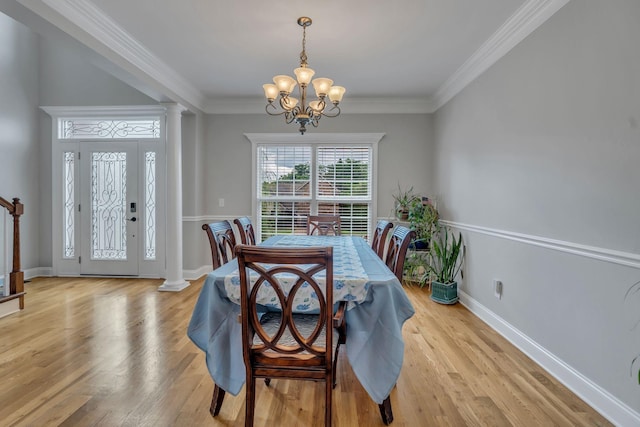 201 Abbey Rd, Lebanon, TN 37090 - dining area featuring a chandelier, light wood-style floors, and crown molding