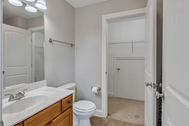 201 Abbey Rd, Lebanon, TN 37090 - bathroom featuring vanity, tile patterned flooring, and a spacious closet