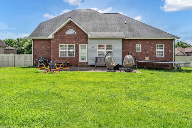 201 Abbey Rd, Lebanon, TN 37090 - rear view of house with entry steps, a fenced backyard, roof with shingles, and brick siding