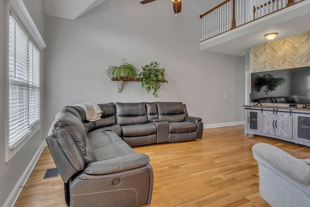 201 Abbey Rd, Lebanon, TN 37090 - living room with ceiling fan, wood finished floors, and a high ceiling