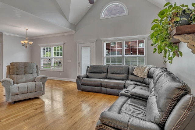 201 Abbey Rd, Lebanon, TN 37090 - living area with a chandelier, light wood-type flooring, high vaulted ceiling, and ornamental molding