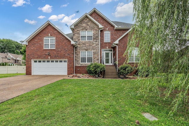 201 Abbey Rd, Lebanon, TN 37090 - traditional home featuring a garage, driveway, and stone siding