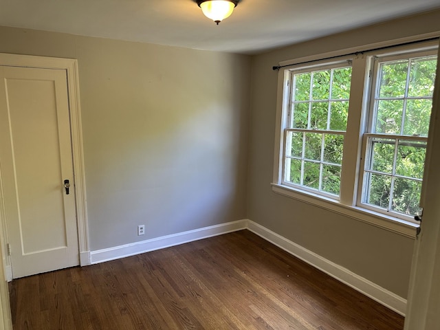 2910 Woodlawn Dr, Nashville, TN 37215 - empty room with baseboards and dark wood finished floors